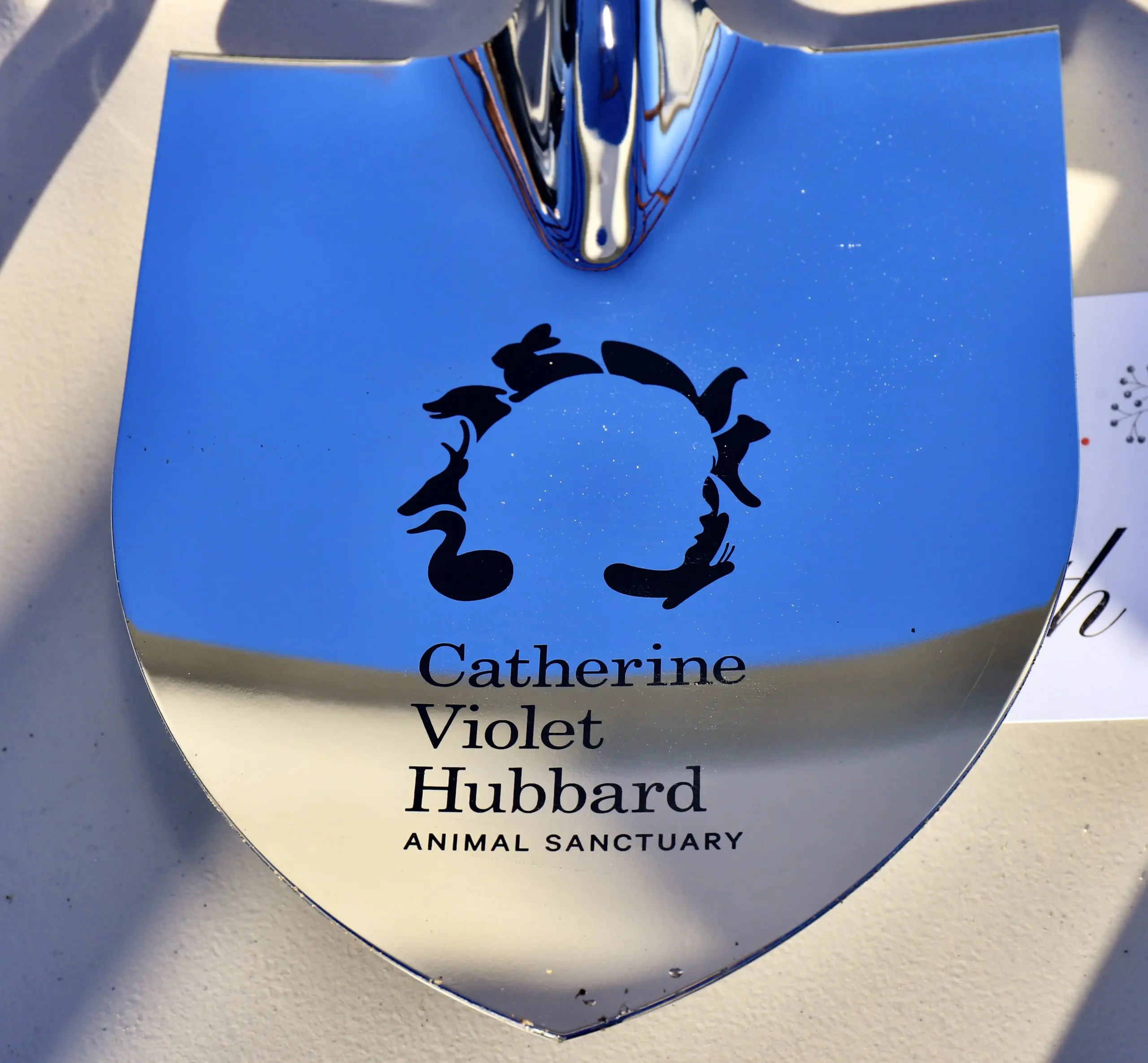 Photo of Shovel with the Words Catherine Violet Hubbard Animal Sanctuary Written on It