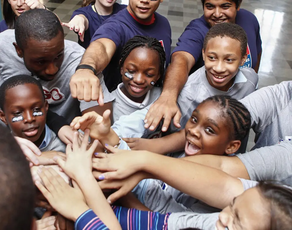Children and Young People Joining Hands