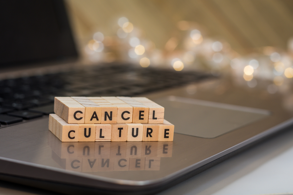 Cancel Culture Letter Blocks on Laptop Keyboard